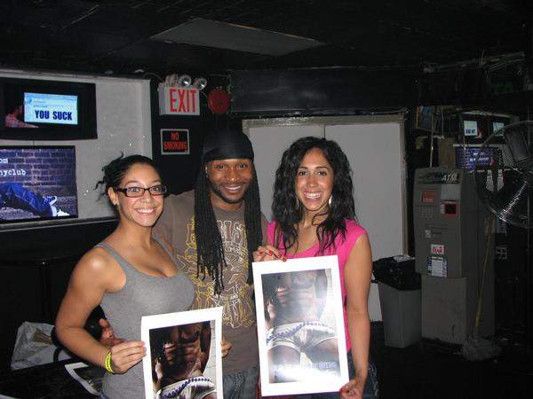 T.D. Faison with ladies at 12.6 Blessing or Curse Signing.....