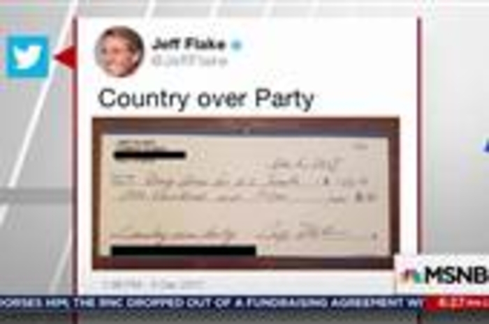 Jeff Flake sends check to Doug Jones campaign