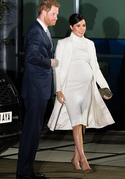 Duchess Meghan just wore a stunning recycled outfit for date night with Prince Harry