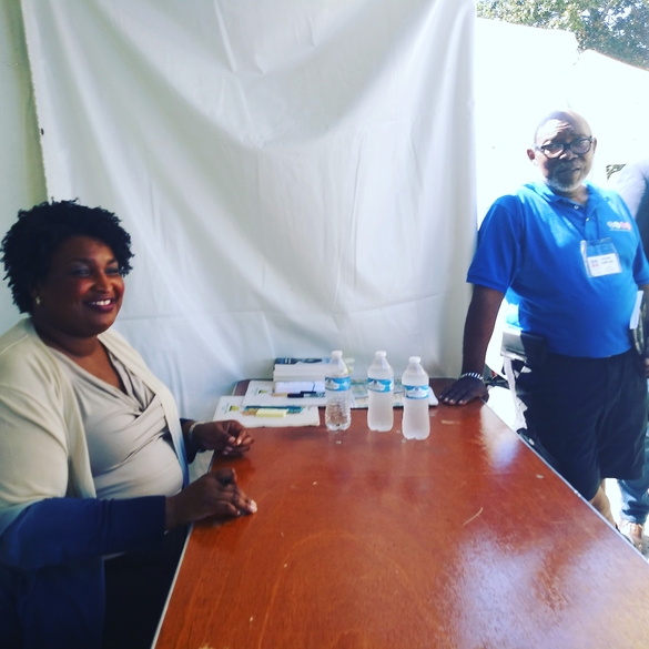 Julius Thompson at Decatur Book Festival with Stacey Abrams.